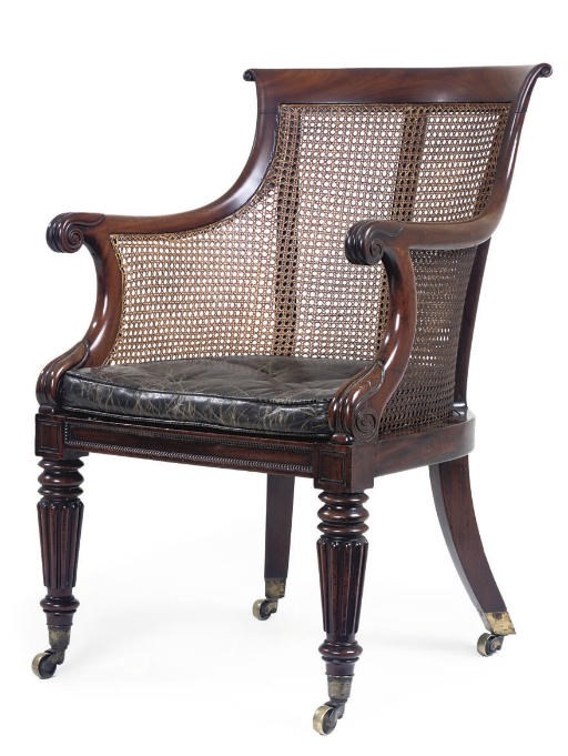A GEORGE IV MAHOGANY CANED BERGERE