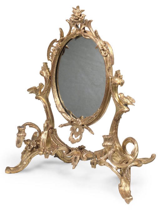 A GILTWOOD AND COMPOSITION GIRONDOLE DRESSING MIRROR