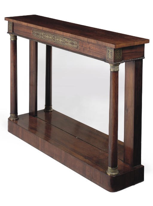 A REGENCY ROSEWOOD AND BRASS INLAID CONSOLE TABLE
