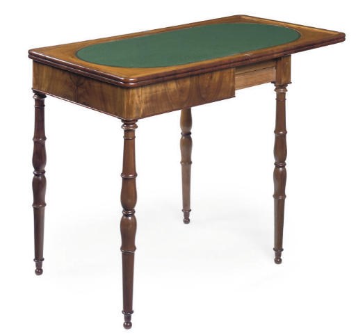 A CHARLES X WALNUT GAMES TABLE
