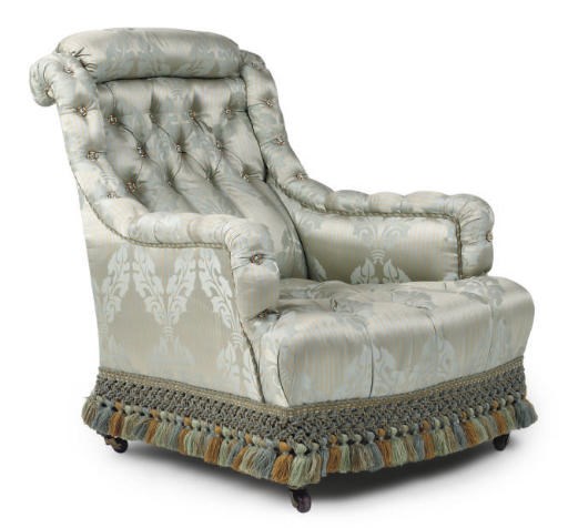 A LATE VICTORIAN WALNUT ARMCHAIR