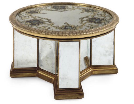 A GILTWOOD AND MIRRORED CIRCULAR LOW TABLE