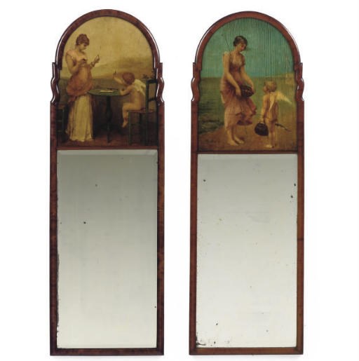 A PAIR OF WALNUT PIER MIRRORS