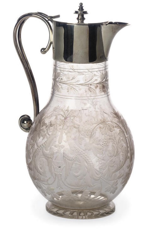 A VICTORIAN GLASS GLARET JUG WITH ELECTROPLATED MOUNT