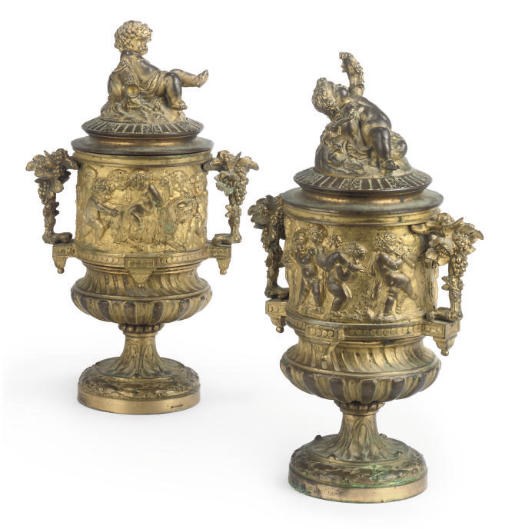 A PAIR OF GILT BRONZE URNS
