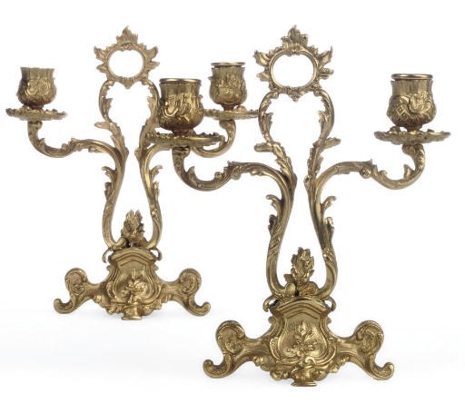 A PAIR OF GILT METAL TWIN LIGHT CANDELABRA