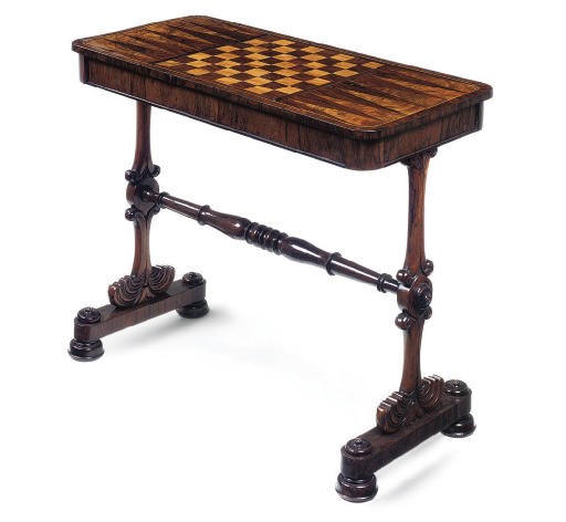 A ROSEWOOD AND WALNUT MARQUETRY GAMES TABLE