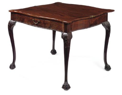 A GEORGE III MAHOGANY SERPENTINE TEA TABLE