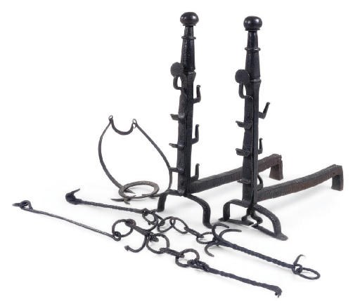 A PAIR OF CAST IRON ANDIRONS
