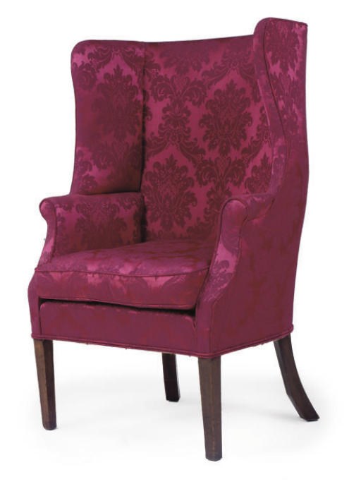 A LATE VICTORIAN MAHOGANY WING ARMCHAIR