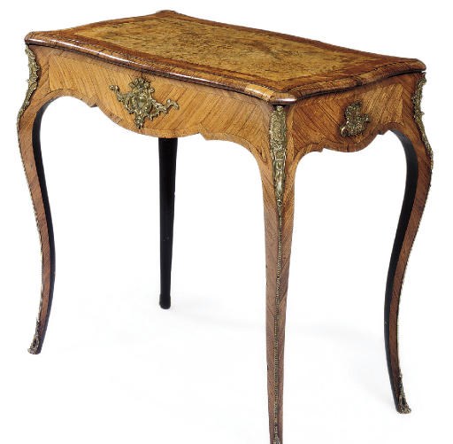 A MID VICTORIAN GILT-METAL MOUNTED WALNUT KINGWOOD AND TULIPWOOD CROSSBANDED CENTRE TABLE
