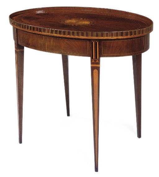 A DUTCH MAHOGANY AND INLAID OVAL CENTRE TABLE