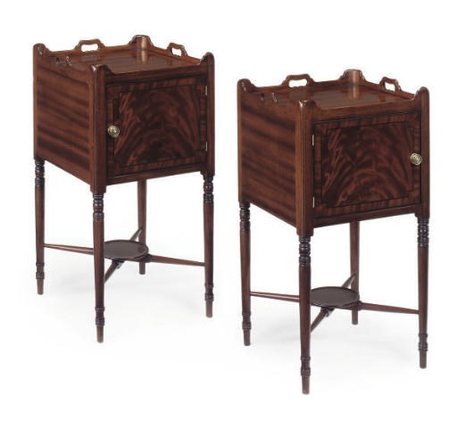 A PAIR OF MAHOGANY BEDSIDE CUPBOARDS