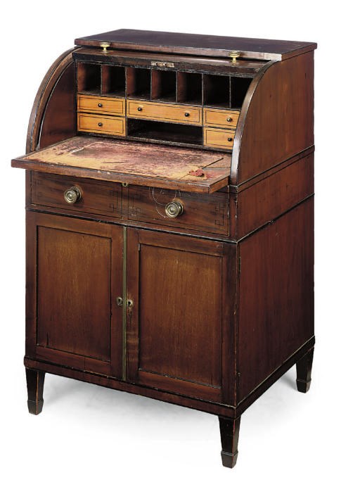 A REGENCY MAHOGANY CYLINDER BUREAU