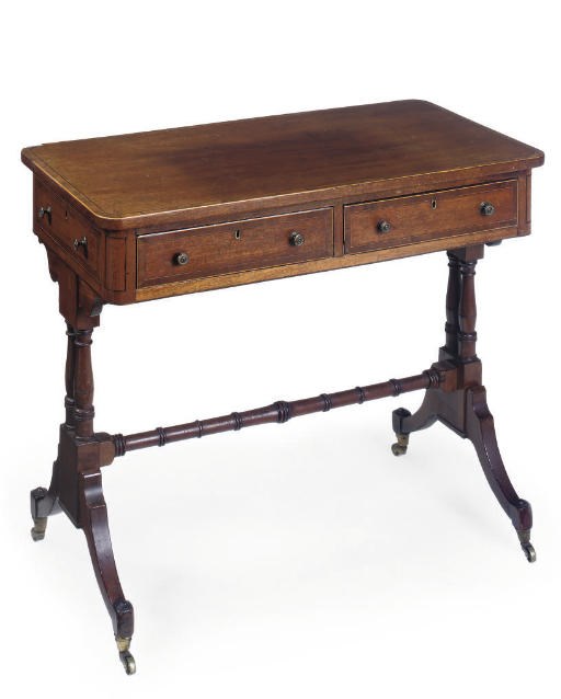 A REGENCY MAHOGANY AND ROSEWOOD CROSSBANDED OCCASIONAL TABLE