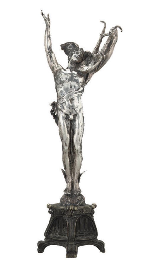 AN EDWARDIAN CAST SILVER TROPHY STATUETTE MODELLED AS HERMES MERCURY