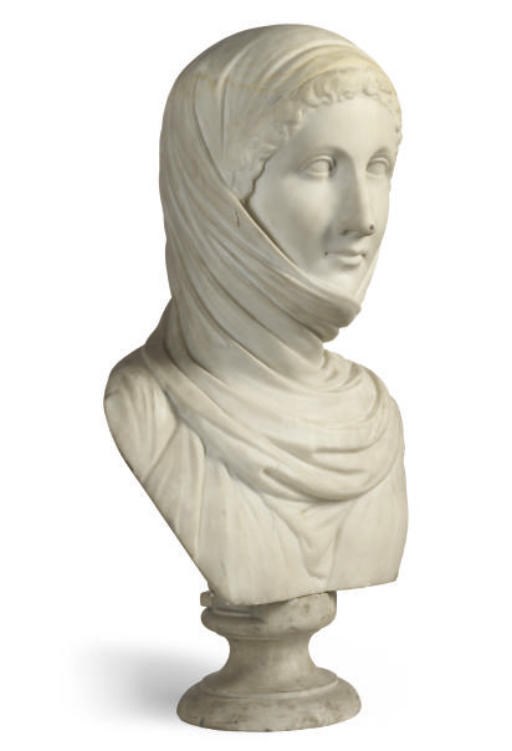 AN ITALIAN CARVED MARBLE BUST OF MAIDEN WEARING A HEADRESS