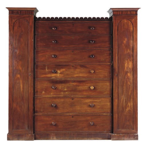 AN EARLY VICTORIAN MAHOGANY TRIPLE-SECTION LINEN PRESS