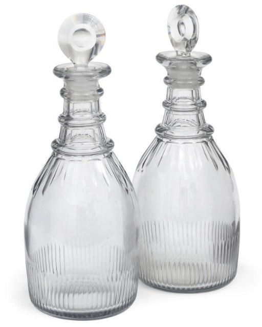 A PAIR OF TRIPLE-RING-NECK DECANTERS AND STOPPERS