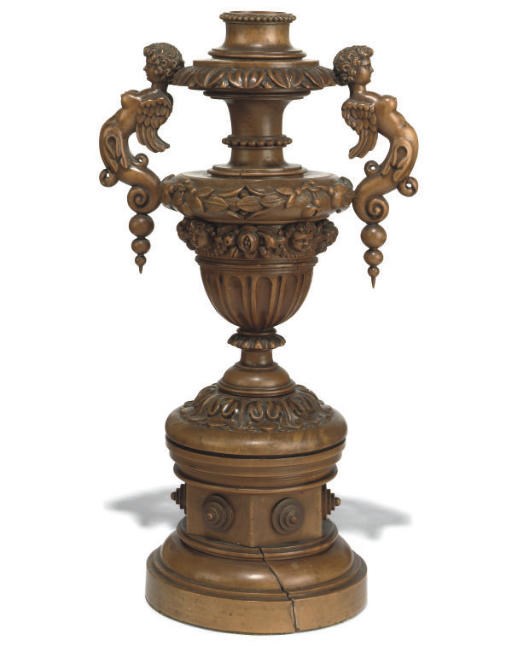 A CONTINENTAL TURNED BOXWOOD ORNAMENTAL URN