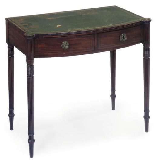 A REGENCY MAHOGANY TWO DRAWER BOW FRONT SIDE TABLE