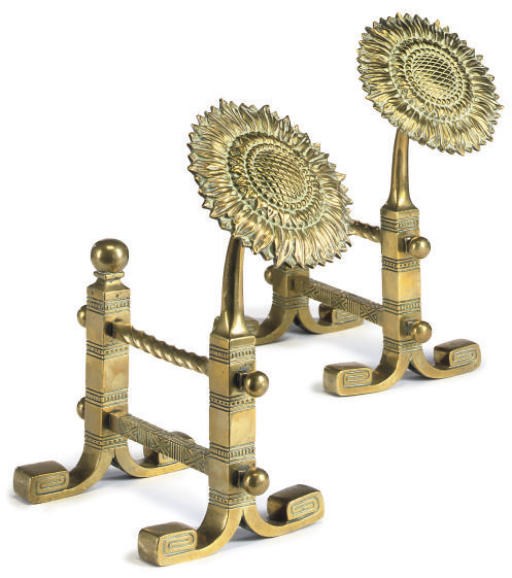 A PAIR OF VICTORIAN POLISHED BRASS ANDIRONS