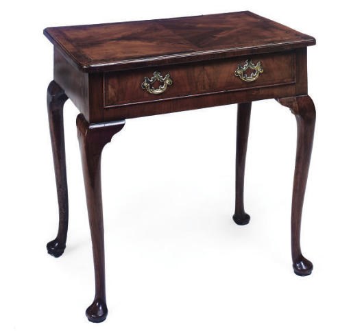 A GEORGE I WALNUT AND FEATHER BANDED SIDE TABLE