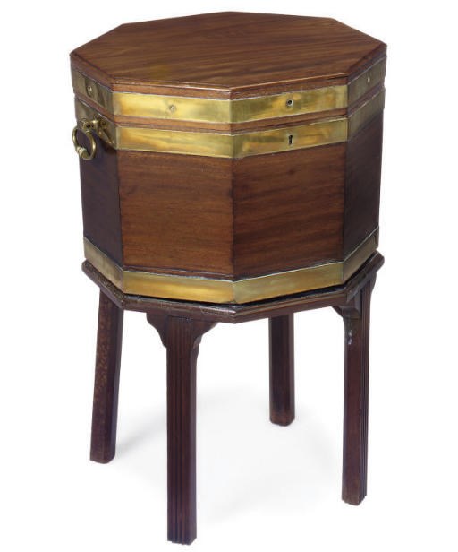 A GEORGE III MAHOGANY CELLERATTE