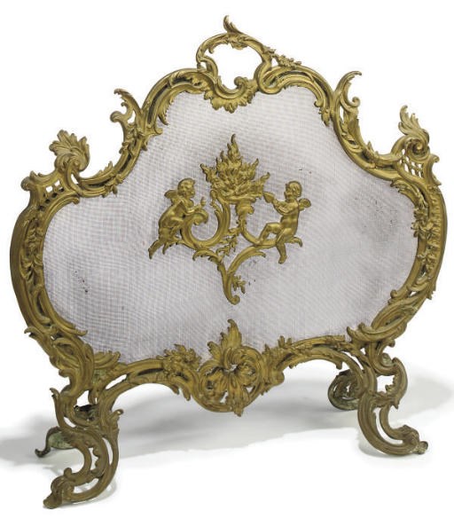 A FRENCH GILT-BRONZE MOUNTED WIRE-MESH FIRE-SCREEN