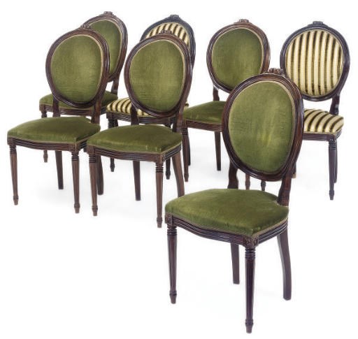 A SET OF SEVEN FRENCH WALNUT FRAMED CHAIRS