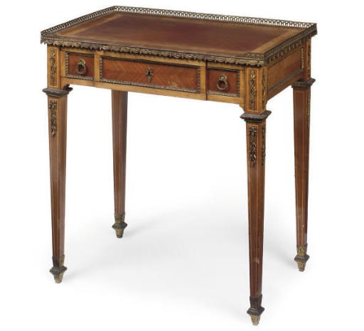 A FRENCH GILT-METAL MOUNTED SIDE OR WRITING TABLE