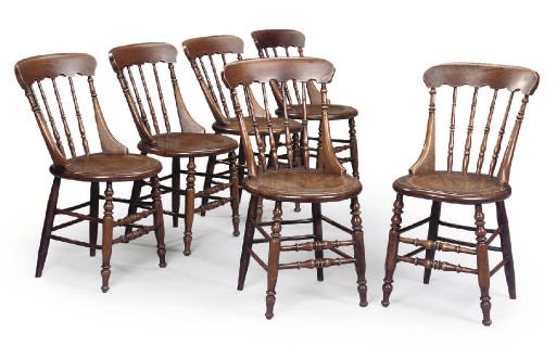 A SET OF SIX NORTH COUNTRY FIGURED ELM KITCHEN CHAIRS