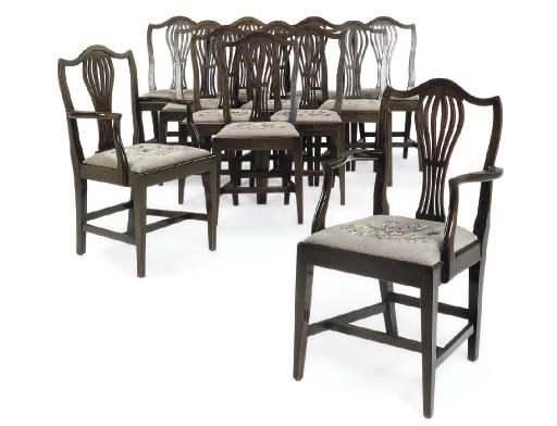 A SET OF TWELVE MAHOGANY DINING CHAIRS