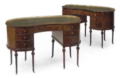 A PAIR OF SYCAMORE AND MAHOGANY KIDNEY SHAPED DESKS