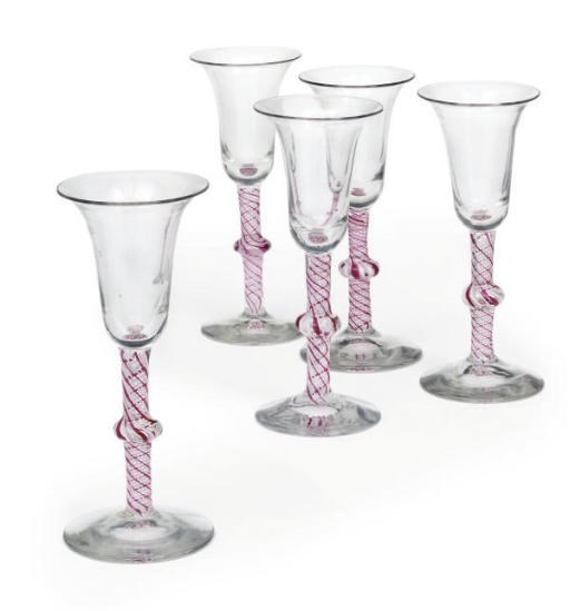 A SET OF TEN RUBY AND WHITE OPAQUE-TWIST WINE GLASSES
