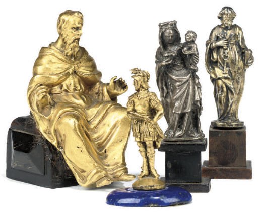 A GROUP OF FOUR EUROPEAN GILT-BRONZE AND SILVER-GILT FIGURES