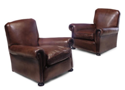 A PAIR OF LEATHER UPHOLSTERED CLUB ARMCHAIRS