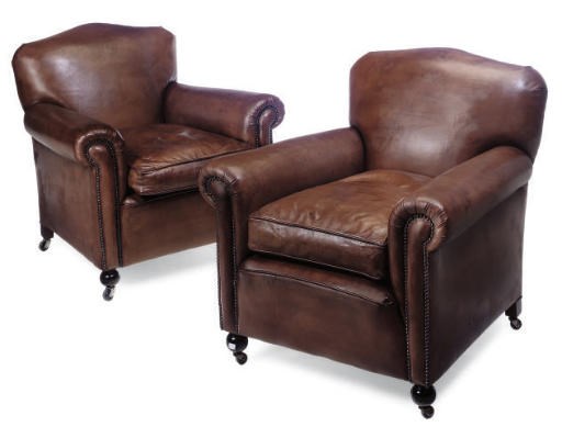 A PAIR OF LEATHER UPHOLSTERED CLUB ARMCHAIRS