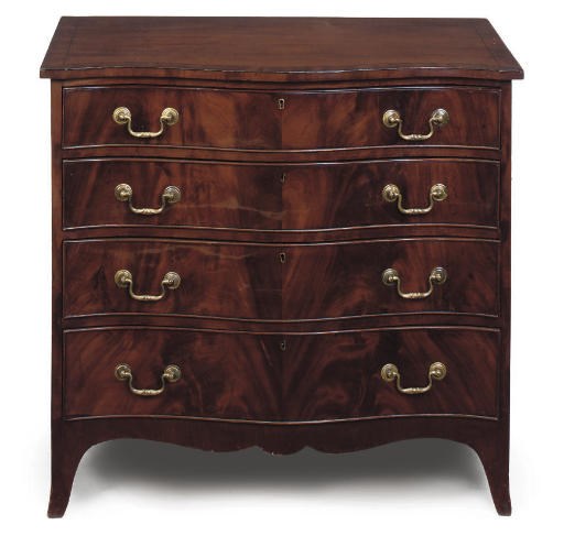 A MAHOGANY SERPENTINE CHEST