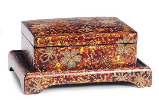 A JAPANESE WHITE SPRINKLE LACQUERED BOX, COVER, AND STAND WITH OVERALL CHERRY BLOSSOM DECORATION,