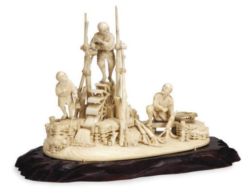 A JAPANESE IVORY FIGURE GROUP OF FARMERS AND A WATER WHEEL,