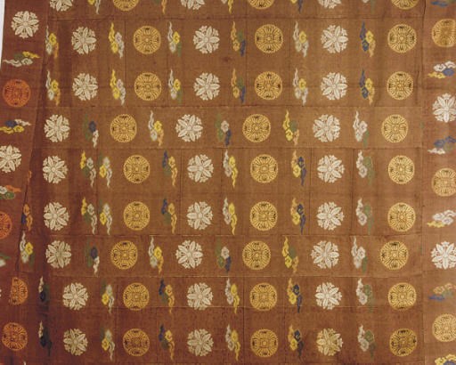 A JAPANESE SILK BROCADE DARK PURPLE GROUND RECTANGULAR PANEL,