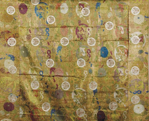 A JAPANESE SILK BROCADE GOLD GROUND RECTANGULAR PANEL WITH TOKUGAWA CRESTS,