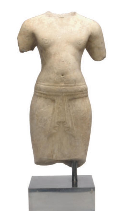 A KHMER STYLE SANDSTONE MODEL OF A MALE TORSO,