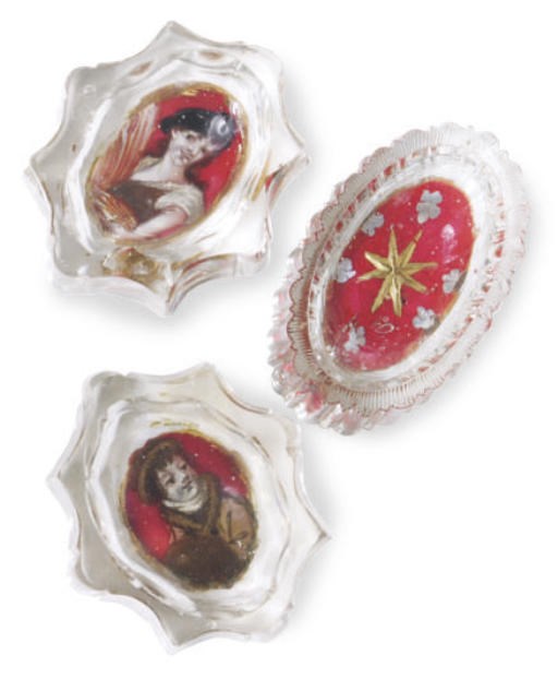 A PAIR OF REVERSE-PAINTED GLASS SALT CELLARS AND ANOTHER REVERSE- PAINTED GLASS SALT CELLARS,