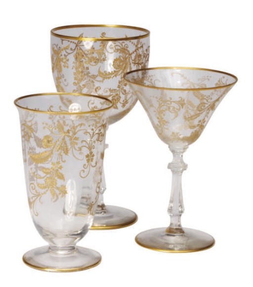 AN ITALIAN GILT PART STEMWARE SERVICE,