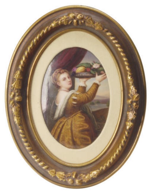 A GERMAN PORCELAIN OVAL PLAQUE IN A GILT WOOD FRAME,