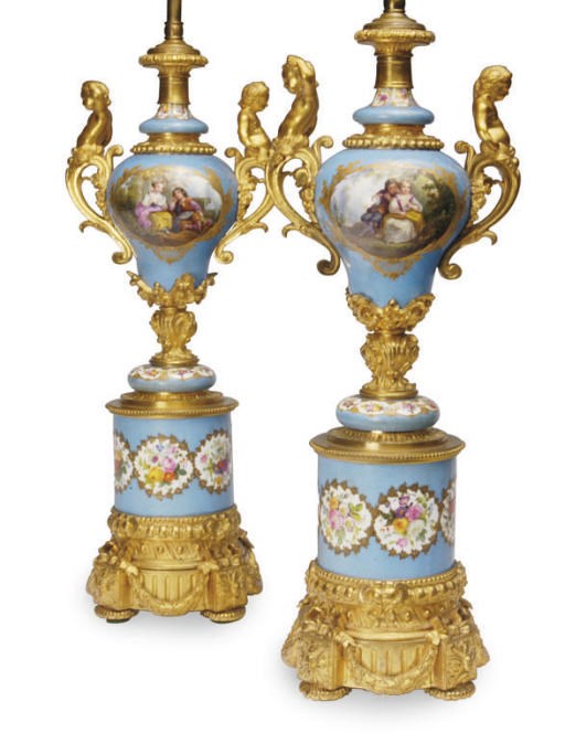 A PAIR OF ORMOLU-MOUNTED SÈVRES STYLE VASES MOUNTED AS LAMPS,