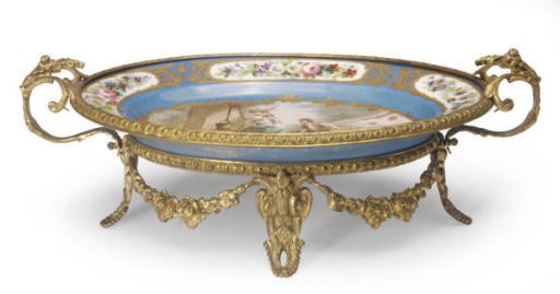 A SÈVRES-STYLE GILT-METAL MOUNTED TURQUOISE-GROUND OVAL CENTER PIECE,