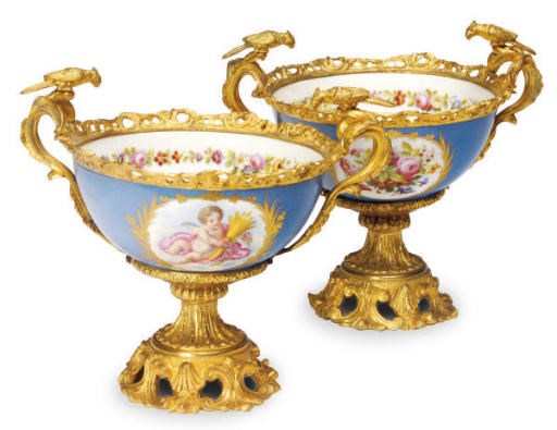 A PAIR OF GILT METAL-MOUNTED SÈVRES STYLE COMPOTES,